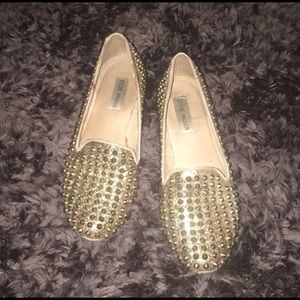 Gold spikey loafers